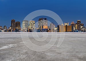 Modern buildings in the city, with empty concrete floor. City background