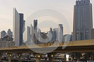 Modern buildings in Dubai at sunset light