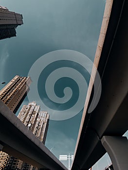 Modern buildings and urban overpass bridge