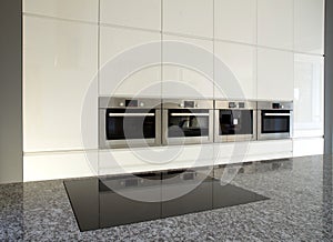 Modern built-in kitchen in white photo