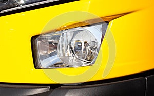 Modern bumper fog light of a truck, close-up, headlight