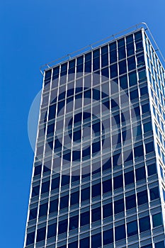 Modern business building against blue sky