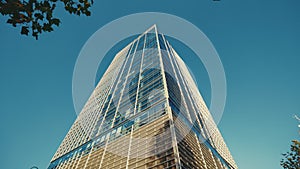 Modern Business Centre High Rise Skyscraper. Low view of the Office Building.