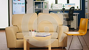 Modern business relax zone interior with confortable couch