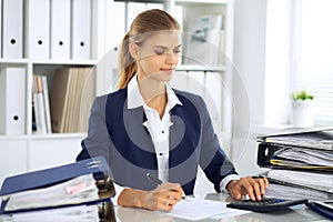 Modern business woman or confident female accountant in office. Student girl during exam preparing. Audit, tax service