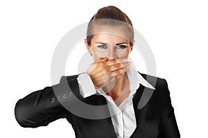 Modern business woman with hand on mouth