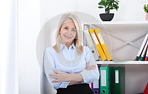 Modern business woman in office with copy space