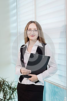 Modern business woman in the office with copy space,Business woman portrait,Successful business woman looking confident and