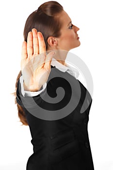 Modern business woman showing stop gesture