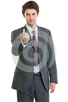 Modern businessman beckoning with finger