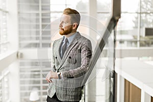 Modern businessman looking at his watch