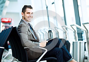 Modern businessman using tablet computer