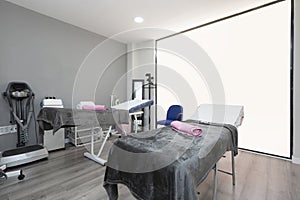 Modern cabin of beauty clinic with stretchers