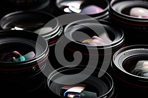 Modern camera lenses with reflections photo