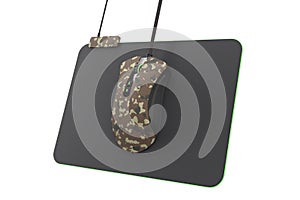 Modern camouflage gaming mouse on professional pad on white with clipping path