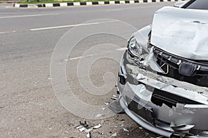 Modern car accident involving two cars on the road