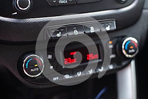 Modern car dashboard. Screen multimedia system. Climate control.