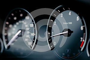 Modern Car Dashboard with Speedometer and Tachometer