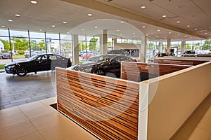 Modern Car Dealership Showroom Interior with Natural Light