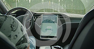 Modern car driving on autopilot. Autopilot car, intelligent vehicle, driveless automobile concept.