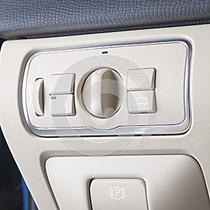Modern car headlight controls.