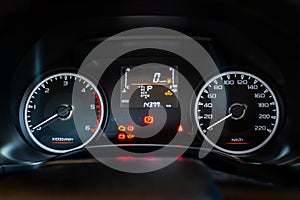 Modern car instrument dashboard panel with digital and analog screen or speedometer and symbol