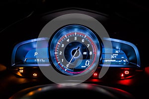 Modern car instrument dashboard panel or speedometer