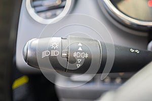 Modern car interior with light switch close up