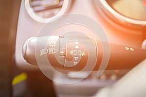 Modern car interior with light switch close up