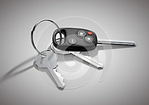 Modern Car keys for passenger vehicle isolated on flat white surface.