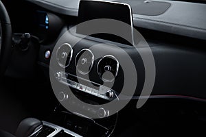 Modern car multimedia screen and dashboard with car air condition control panel