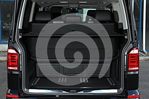 Modern car with open empty trunk