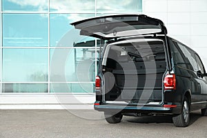 Modern car with open empty trunk