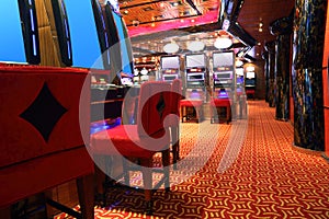 Modern casino hall with game machines photo
