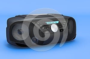 Modern CD Boombox with AM-FM Stereo Radio on blue backdrop, 3D rendering