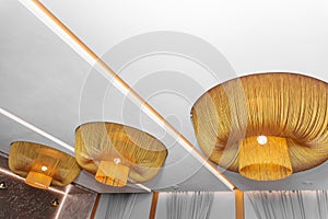 Modern ceiling interior design with vintage orange fabric decorations chandelier light abstract decor room