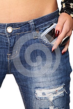 Modern cellphone sticking out of a jeans