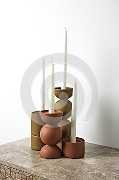 modern ceramic terracotta colored candleholders