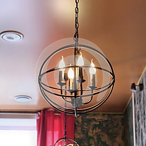 Modern chandelier . Black Metal Hanging Lights.  cutting edge ceiling Light Round shape. Design of home, warm light from shades