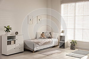 Modern child room interior with bed