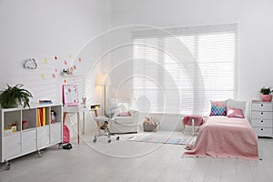 Modern child room interior with bed