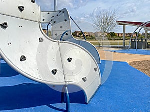 Modern Children playground activities in public park.