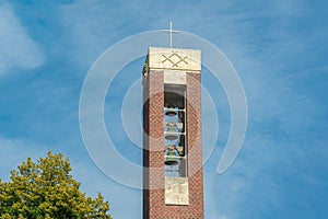 Modern christian church tower with bells in Amsterdam, Netherlands