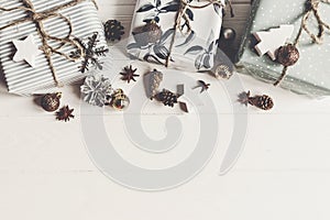 Modern christmas flat lay composition. stylish wrapped presents