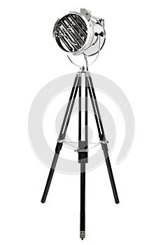 Modern chrome floor lamp with three black wooden legs, isolated