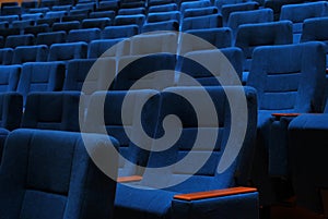 Modern cinema hall empty and blue comfortable seats