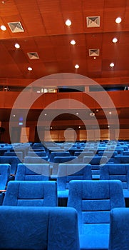 Modern cinema hall empty and blue comfortable seats