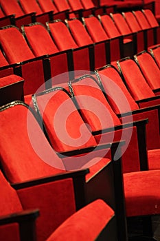 Modern cinema hall empty and red comfortable seats