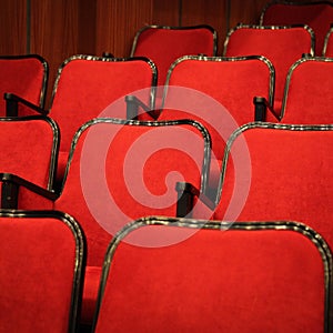 Modern cinema hall empty and red comfortable seats