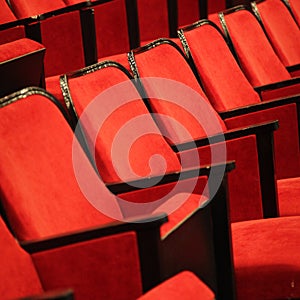 Modern cinema hall empty and red comfortable seats